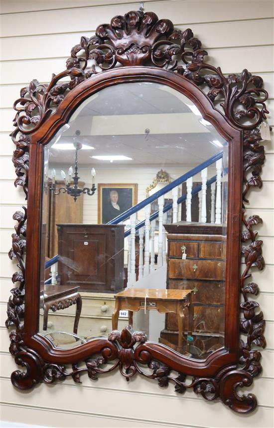 A Victorian style carved mahogany overmantel mirror H.144cm